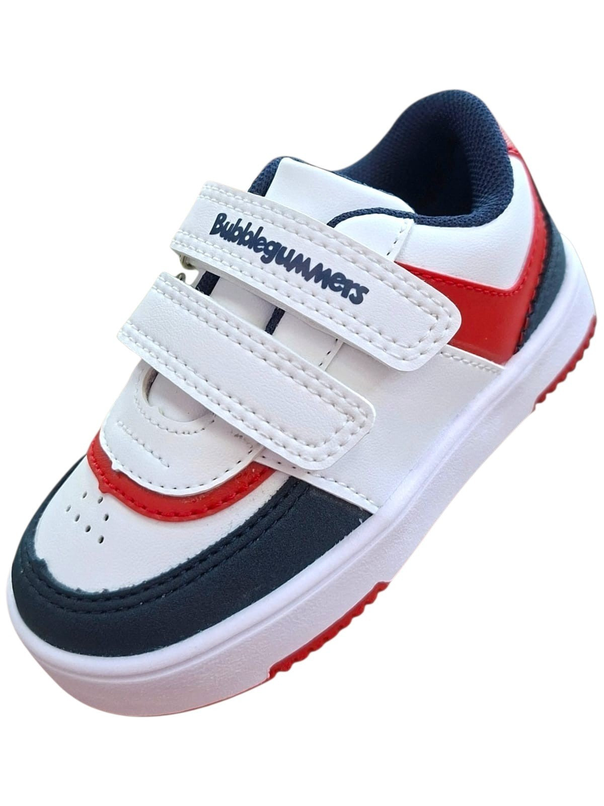 Tenis casuales Calzakids Moritas Bubblegummers para niño en blanco, azul marino y rojo con cierre de doble velcro.
