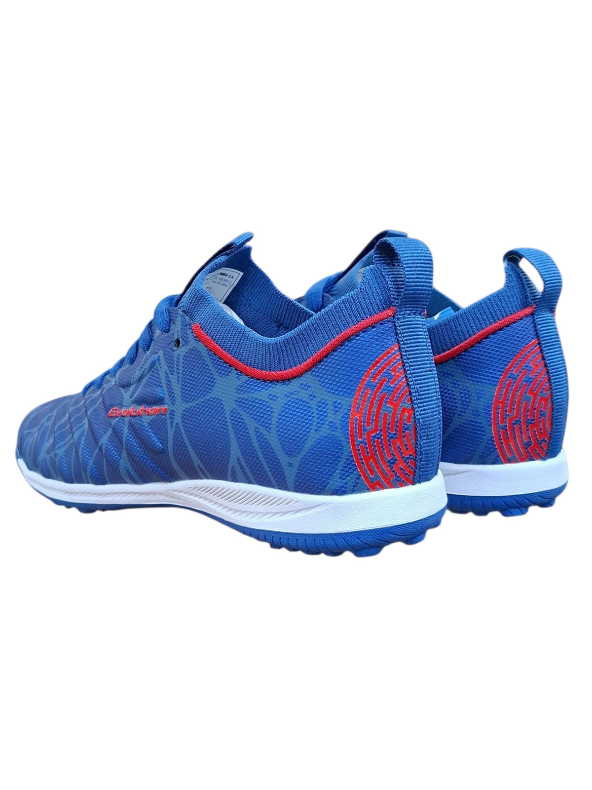 Tenis de futbol Calzakids Moritas Croydon Evolution azules con detalles rojos, tejido transpirable y suela de tacos.